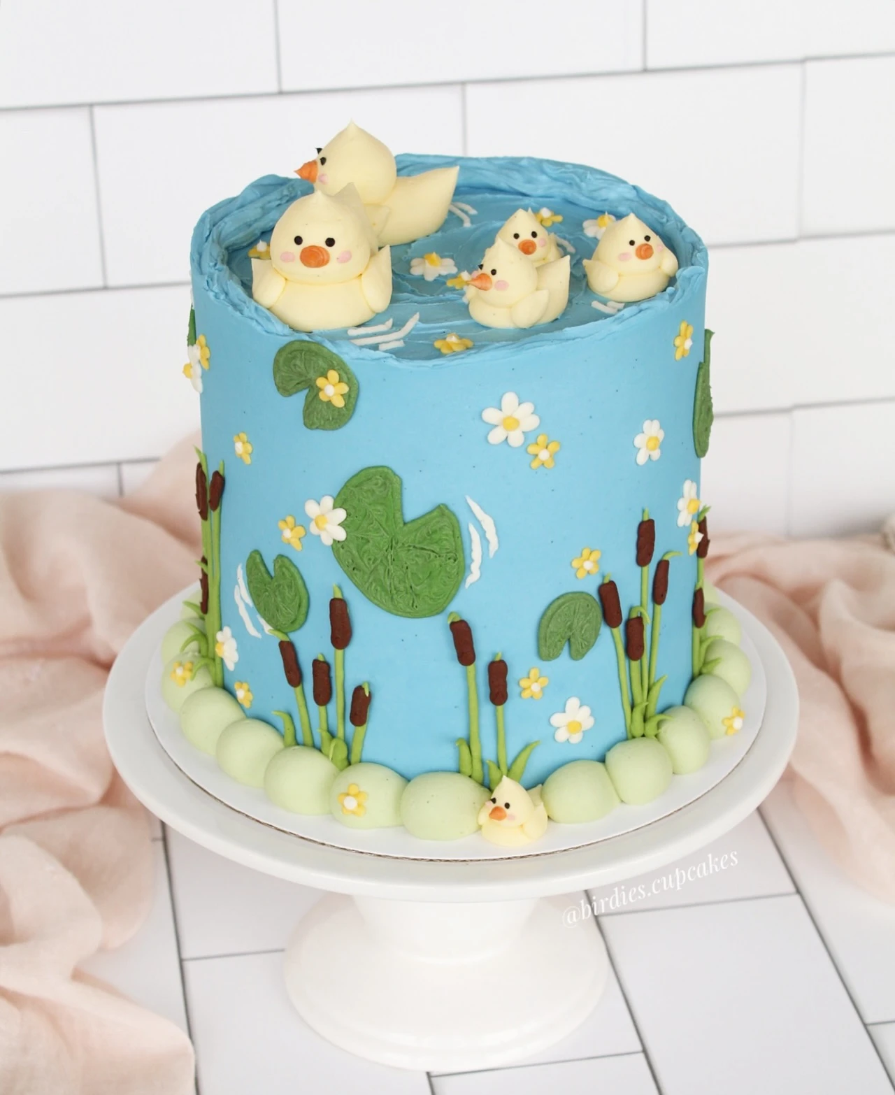 42. Whimsical Duck Pond Cake