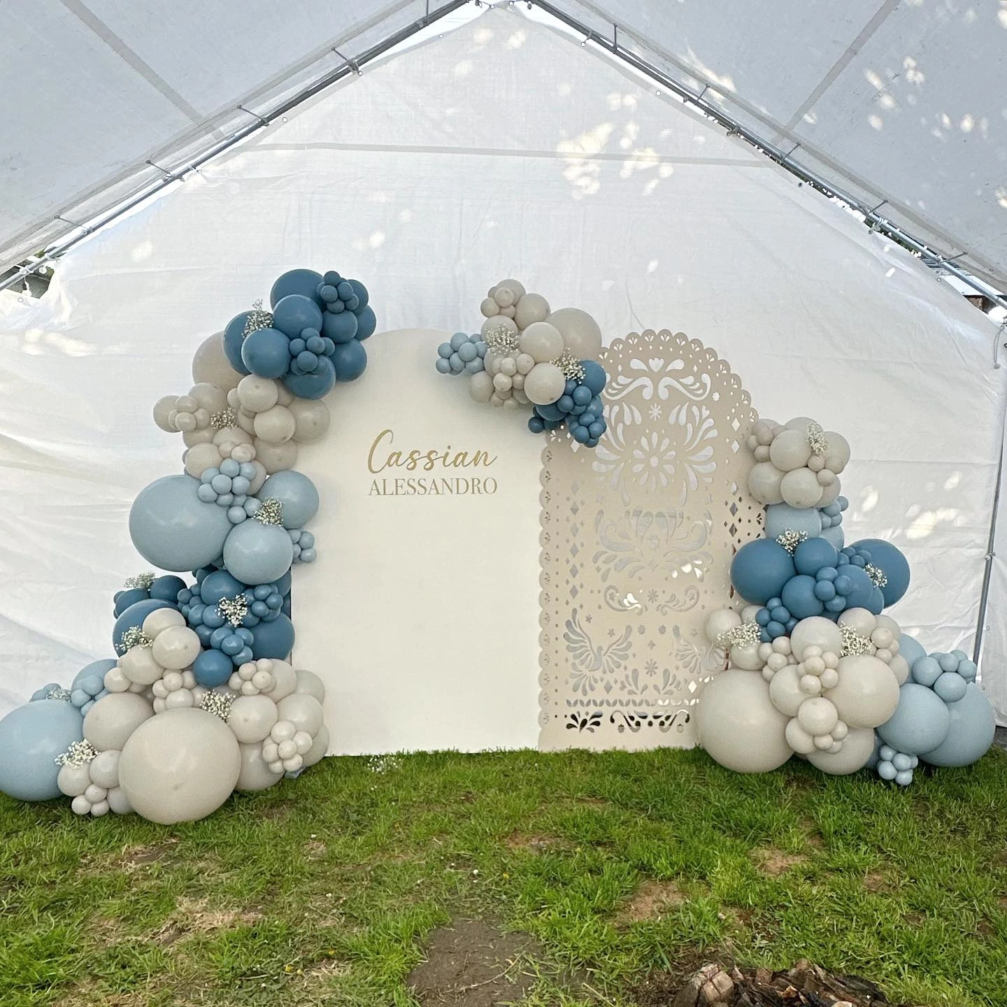 38. Intricate Laser-Cut Panel Backdrop