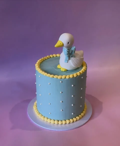 11. Fondant Duck Topper Cake