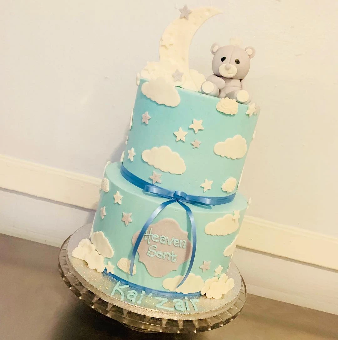 35. Sweet Character Cake Topper