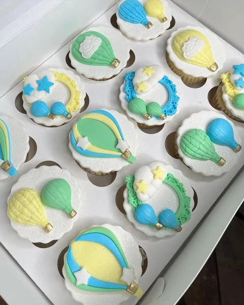 37. Intricate Fondant Cupcake Toppers
