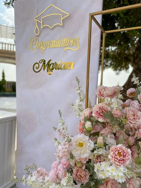7. Frame Your Backdrop with Floral Towers image 3
