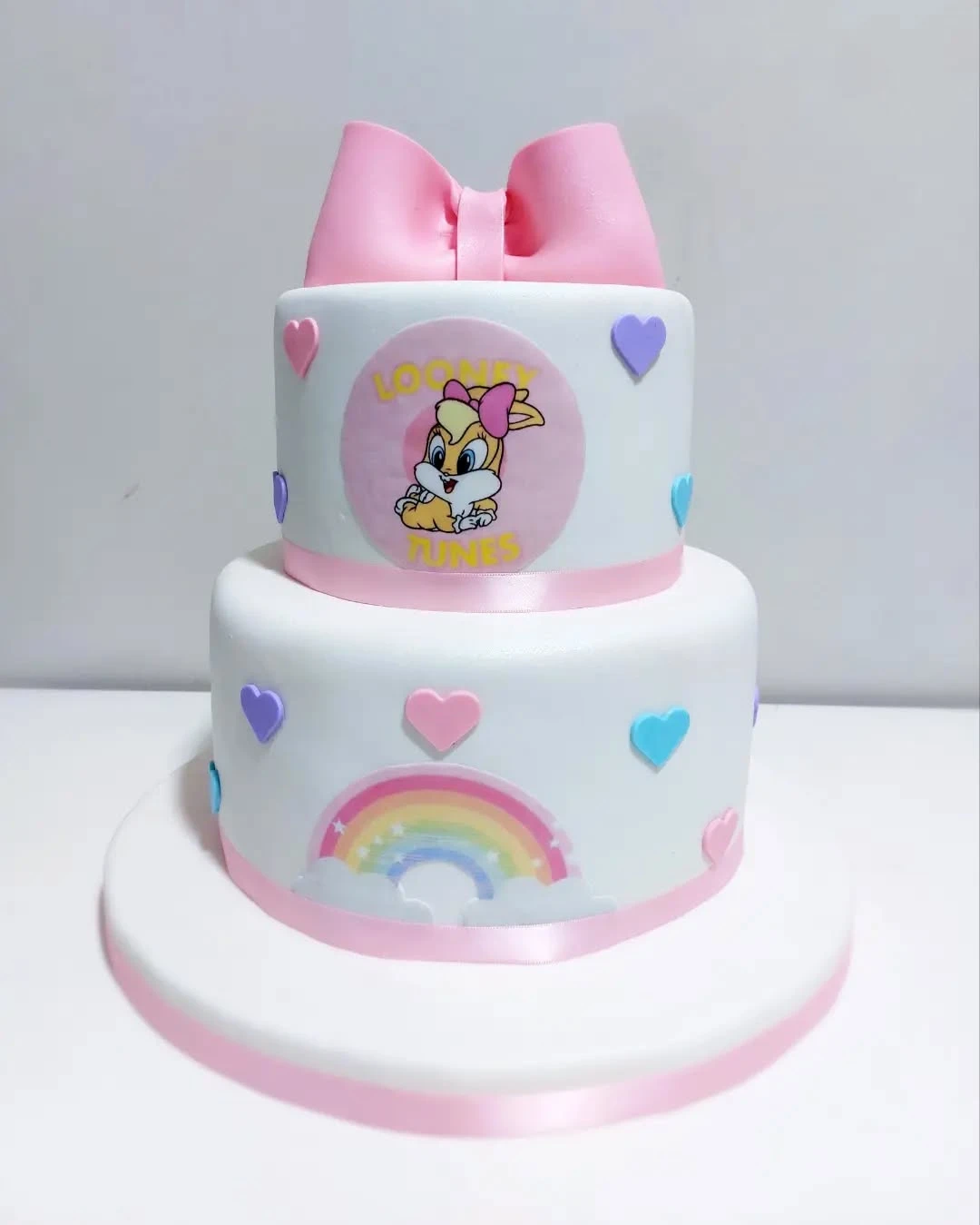 13. Minimalist Fondant Character Cake