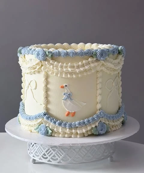 15. Dusty Blue Themed Cake
