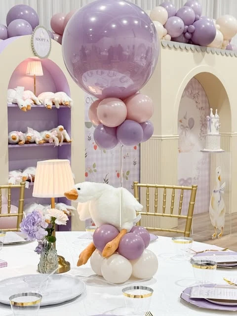 6. Plush Goose Centerpiece