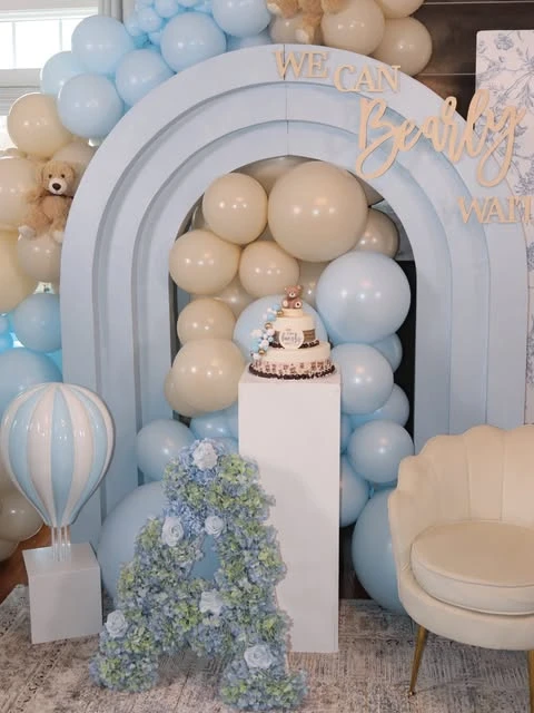26. Layered Arch Cake Display