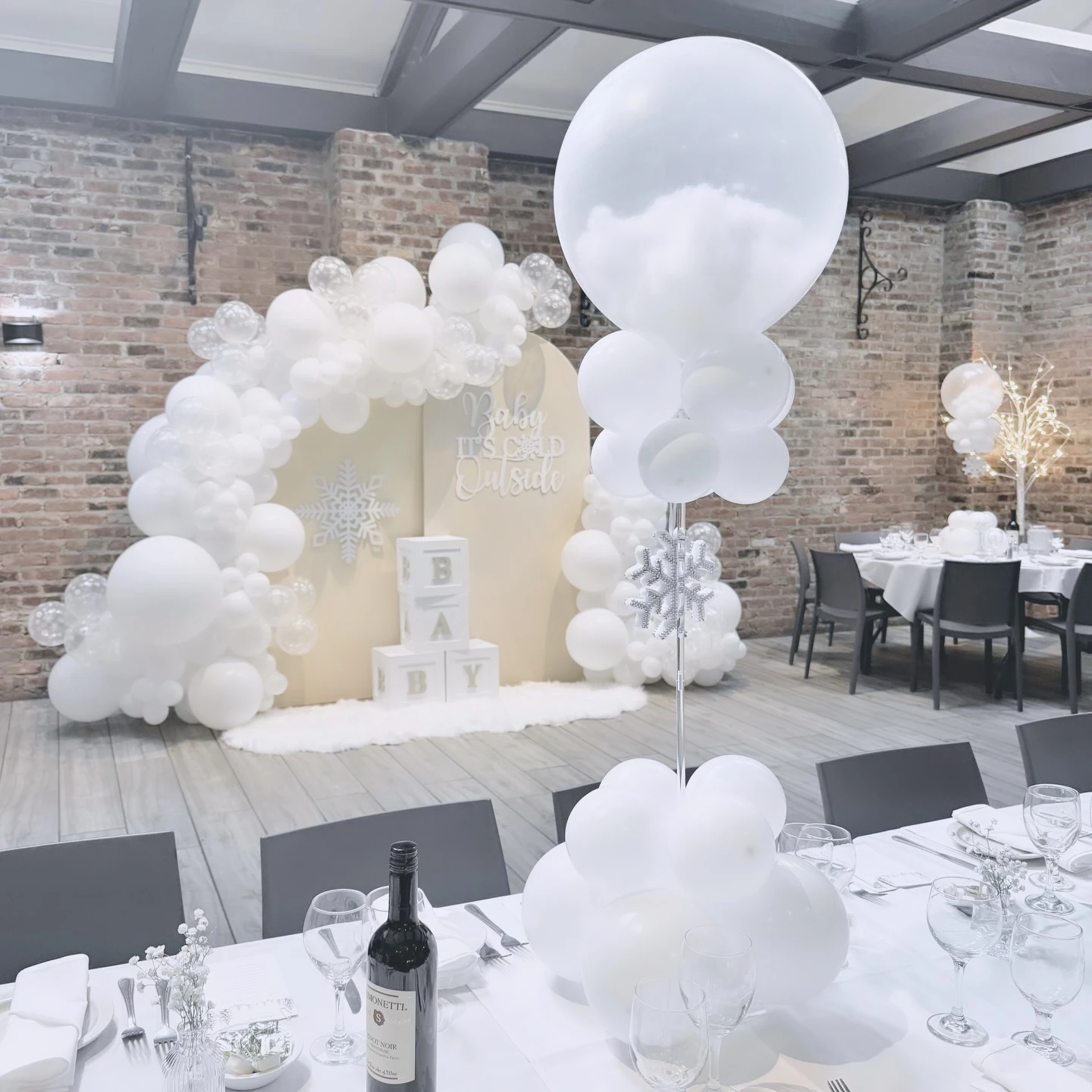 Snowy Balloon Towers baby it s cold outside baby shower ideas