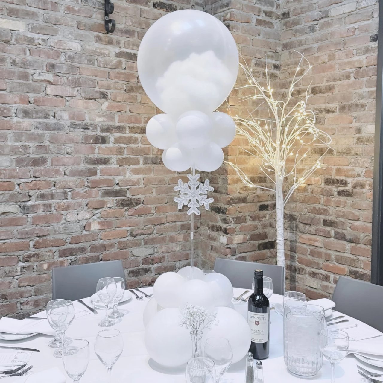 Snowy Balloon Towers baby it s cold outside baby shower ideas