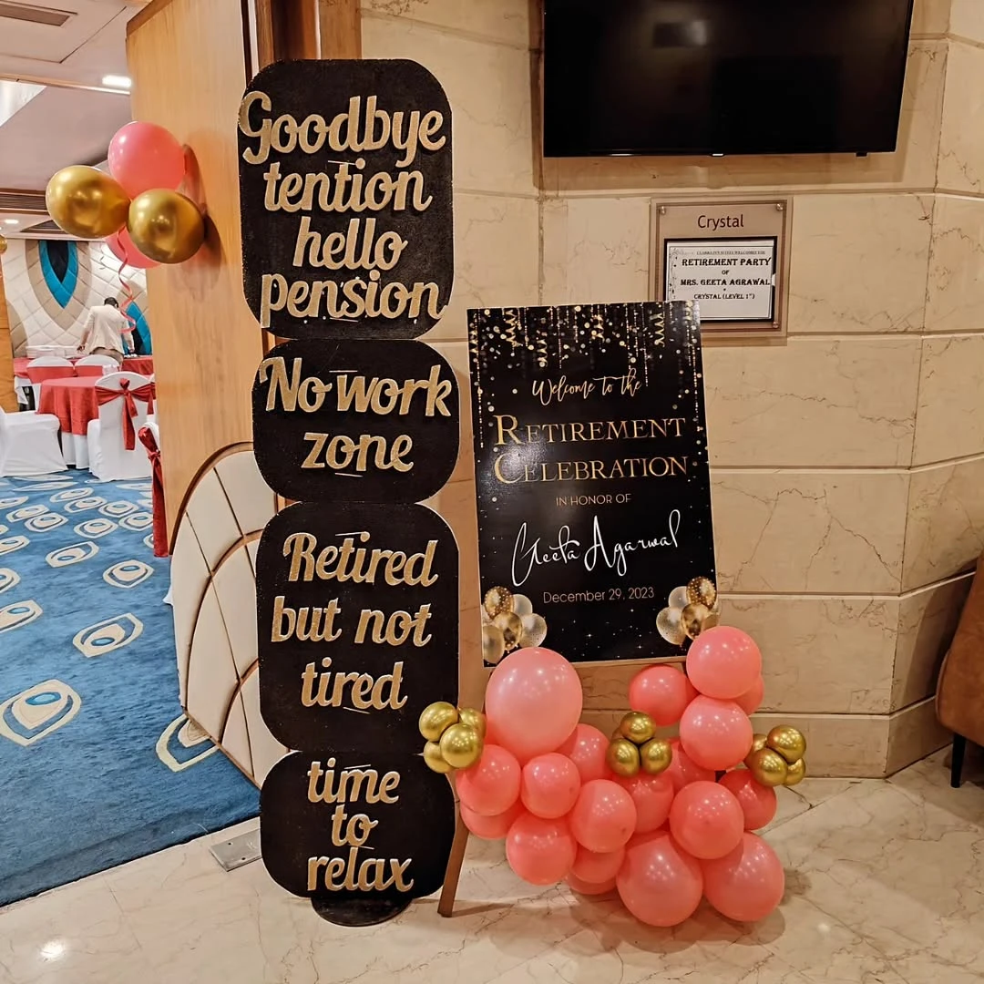 A collection of retirement party entrance signs, including one with funny quotes like 'No work zone'.