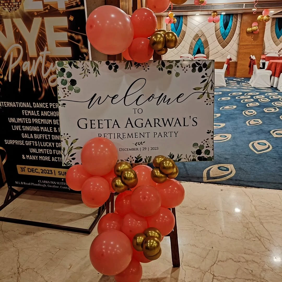 A personalized welcome sign for a retirement party on an easel.