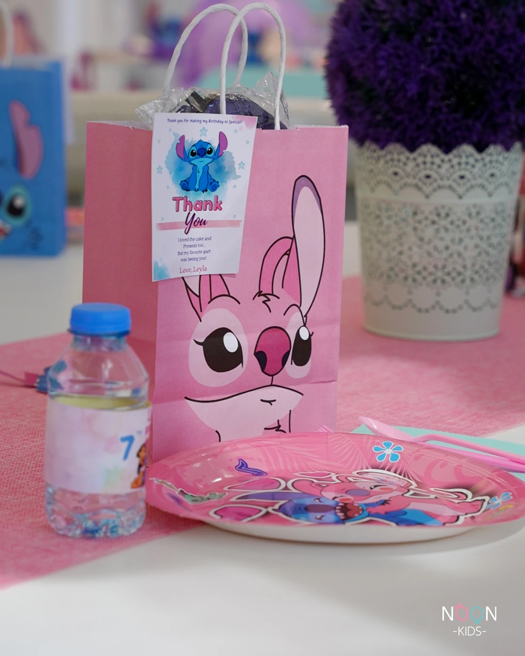 Stitch and Angel themed party favor bag and paper plate.