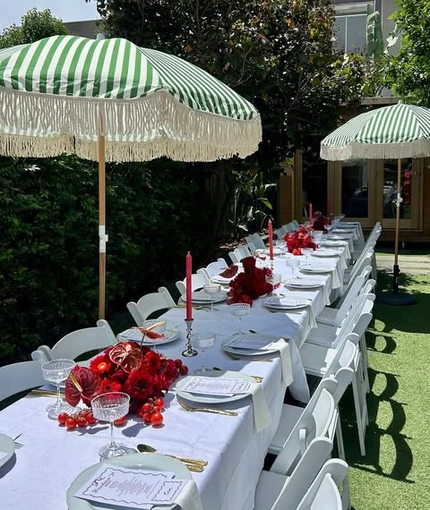 Fringed Umbrella Dining italian summer party theme ideas