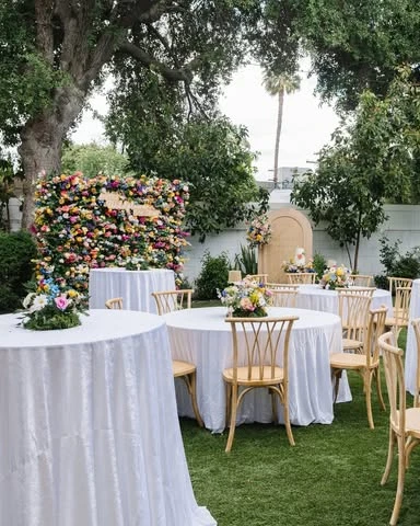 Vibrant flower wall wildflower baby shower theme ideas