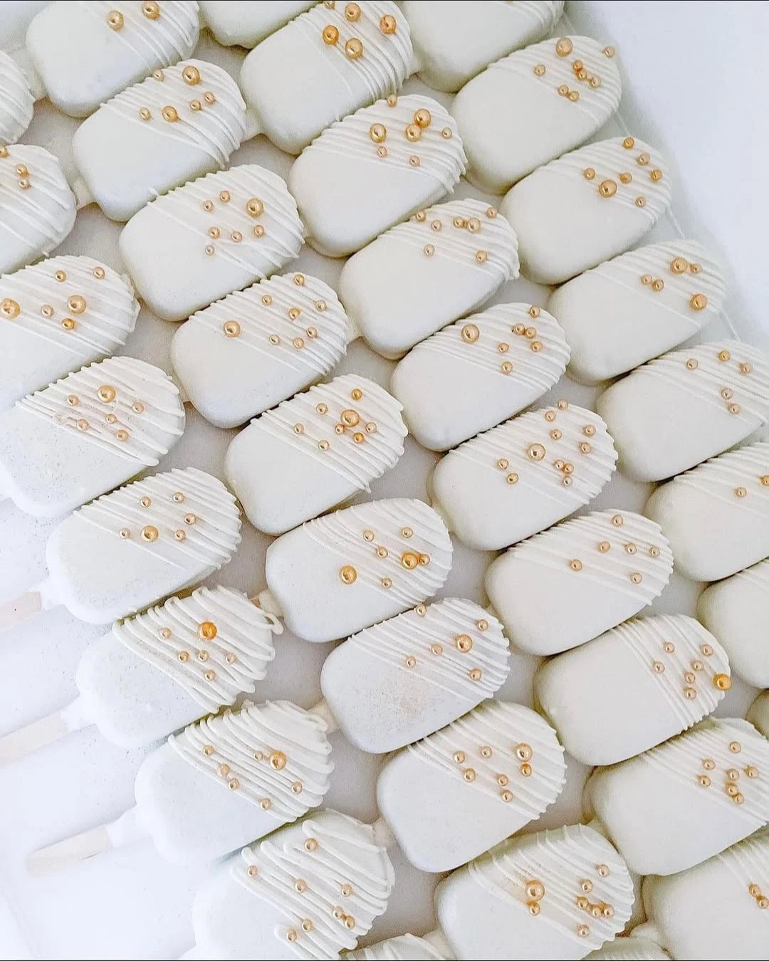 Gilded White Cakesicles a little boo is due baby shower ideas