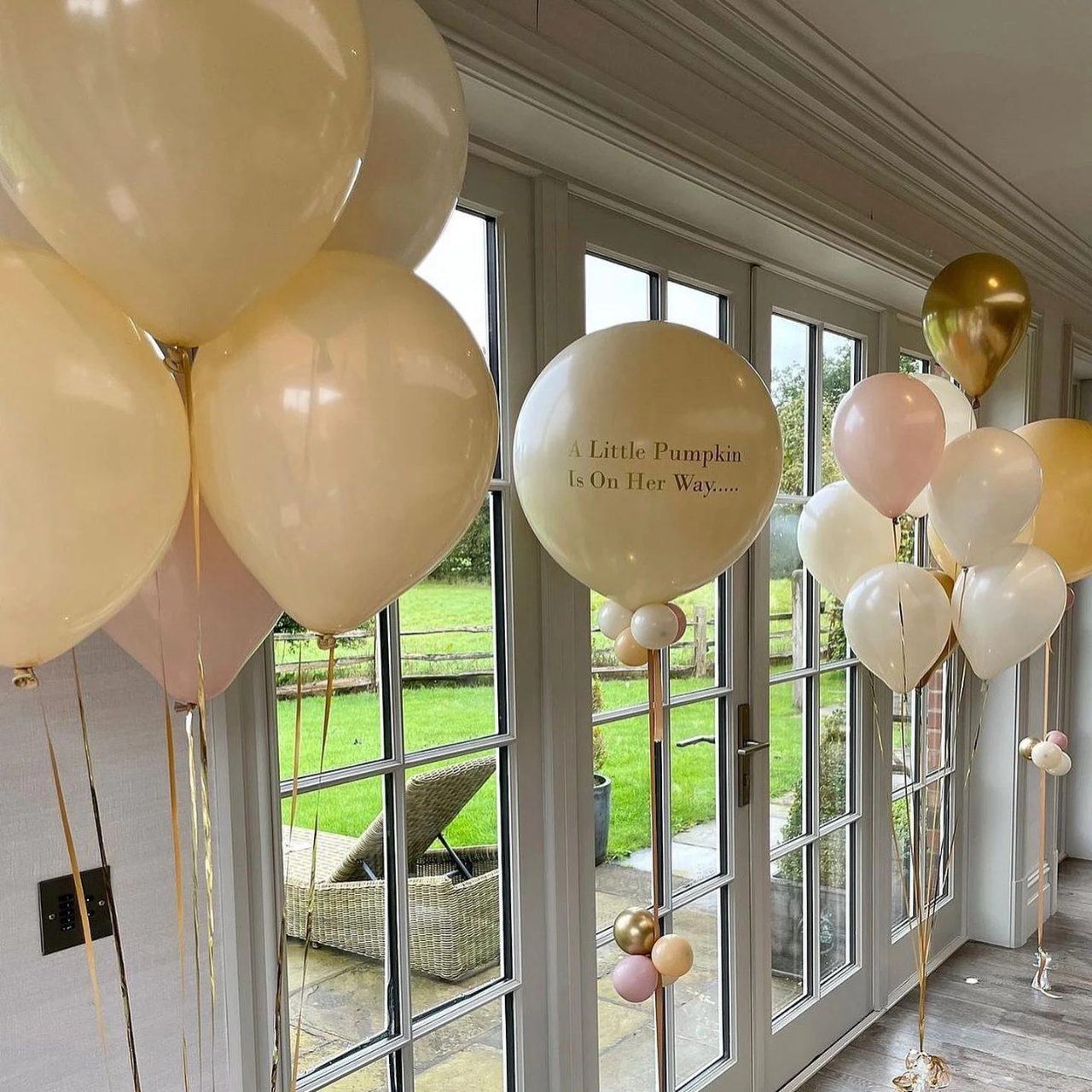 Muted Metallic Balloon Clusters a little pumpkin baby shower theme