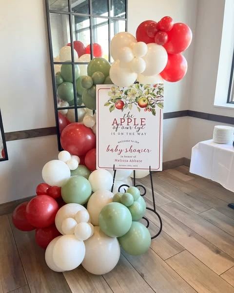 Welcome Signage and Balloons apple of our eye baby shower ideas
