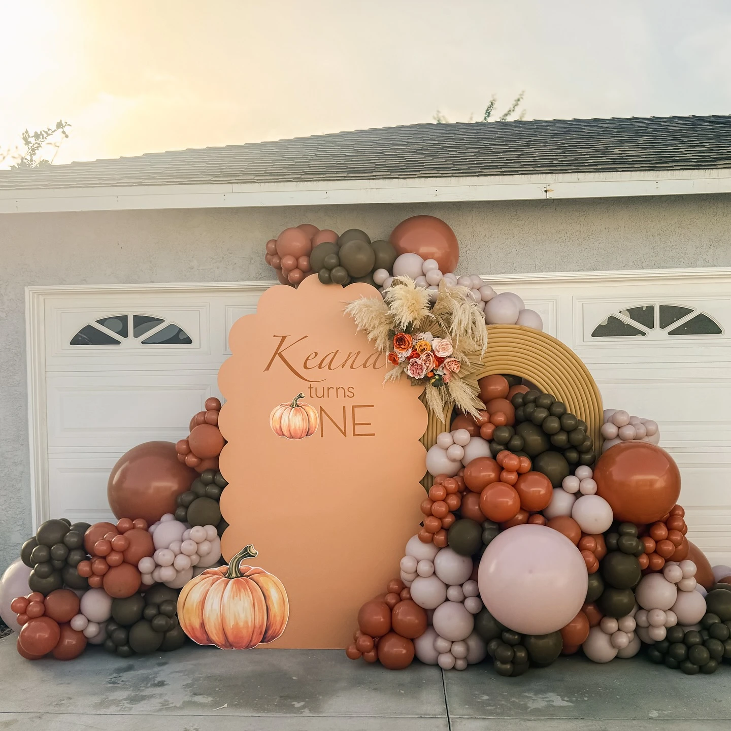 Earthy Pumpkin Backdrop fall birthday party ideas