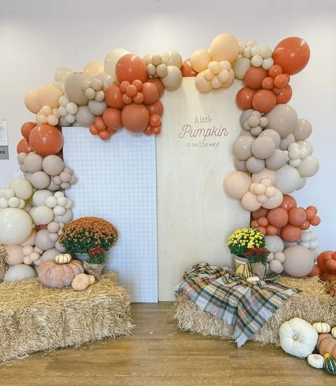 Earthy Balloon Arch Backdrop fall themed baby shower ideas