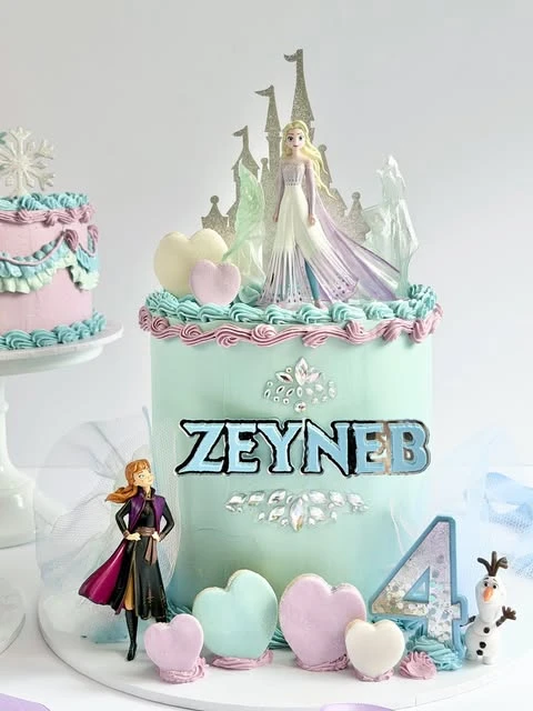 Pastel Character Tall Tier frozen birthday cake