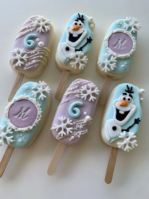Snowman Character Cakesicles frozen birthday party ideas
