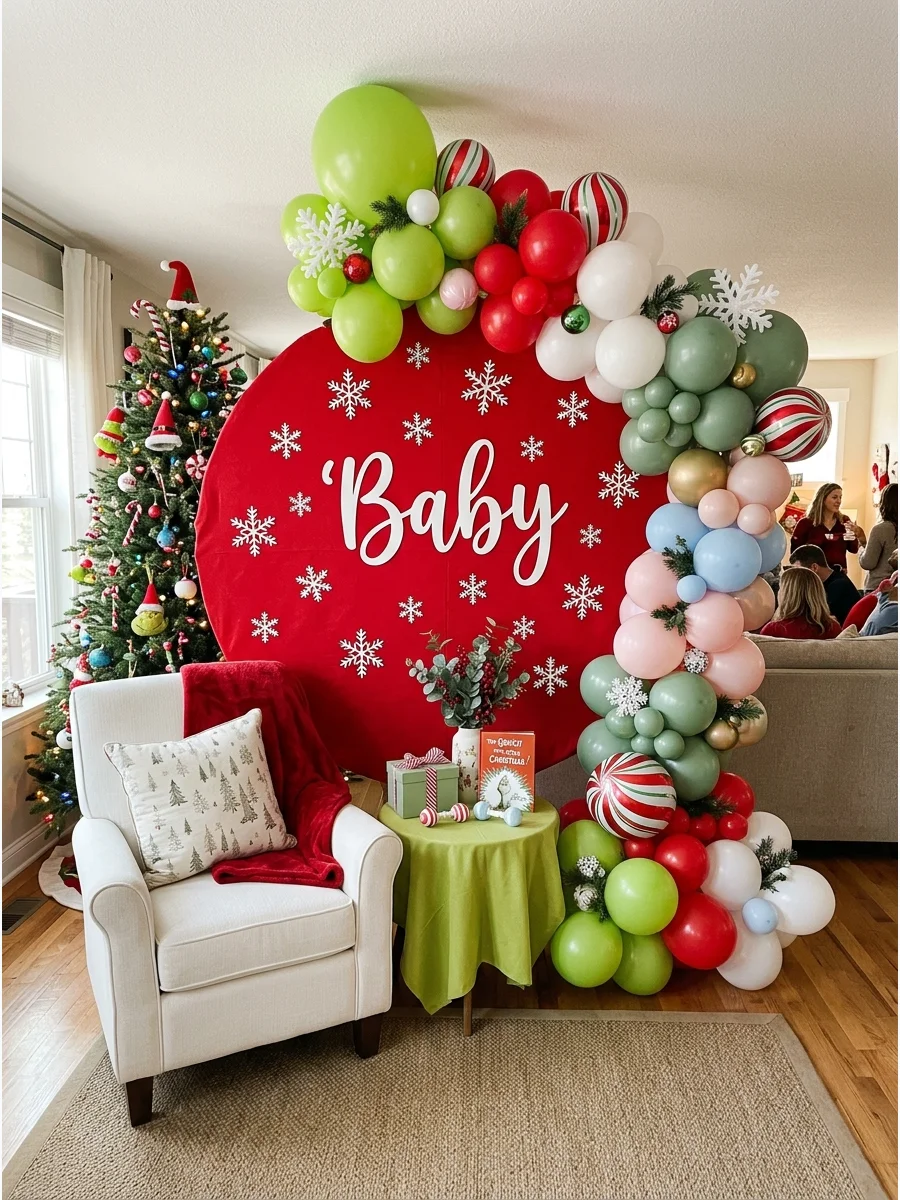 A large red ornament-shaped backdrop with the word Baby.