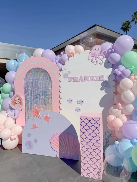 Scalloped Pastel Backdrop mermaid birthday party ideas