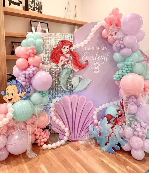 Layered Iridescent Photo Zone mermaid birthday party ideas