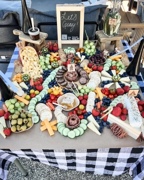 Rustic Grazing Table one happy camper first birthday