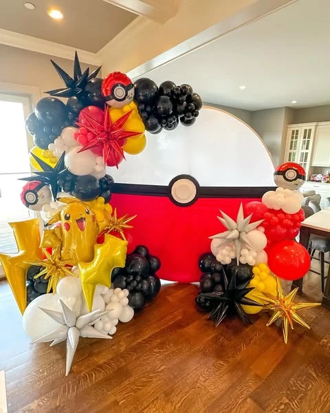 Oversized Poke Ball Backdrop Pokemon birthday party ideas