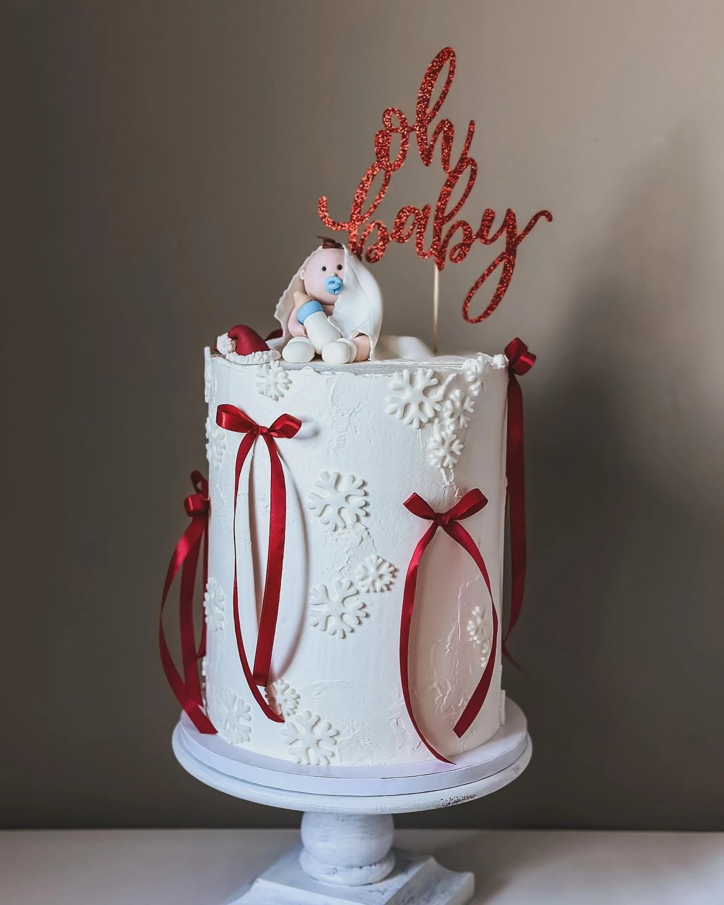 Crimson Ribbon Cake Accents santa baby shower ideas