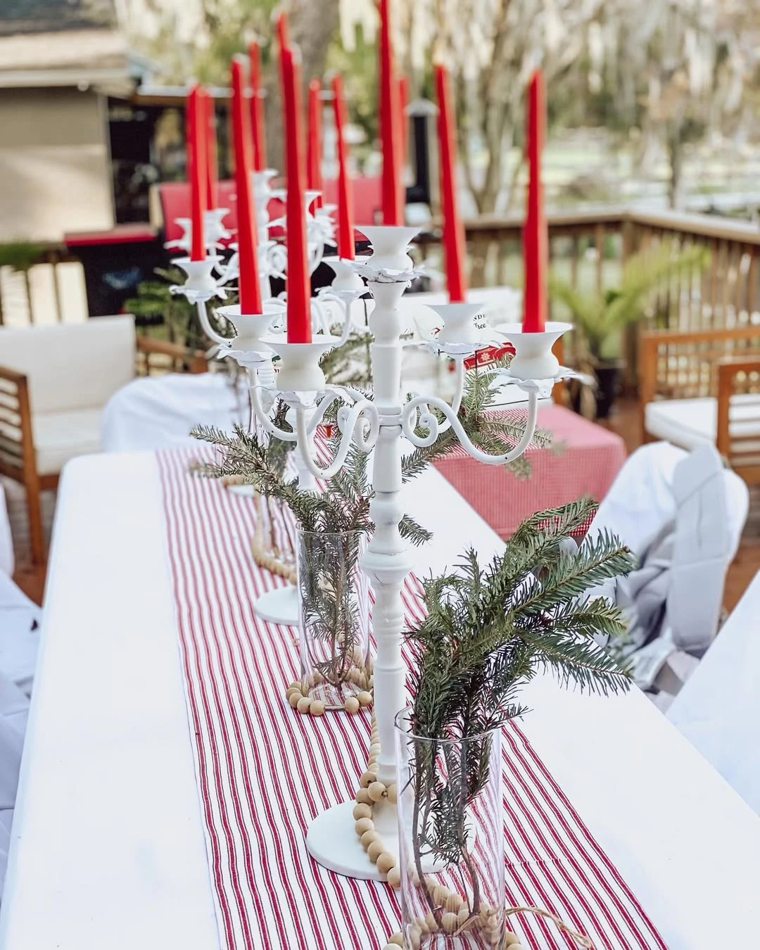 Tapered Candle and Evergreen Tablescapes santa baby shower ideas
