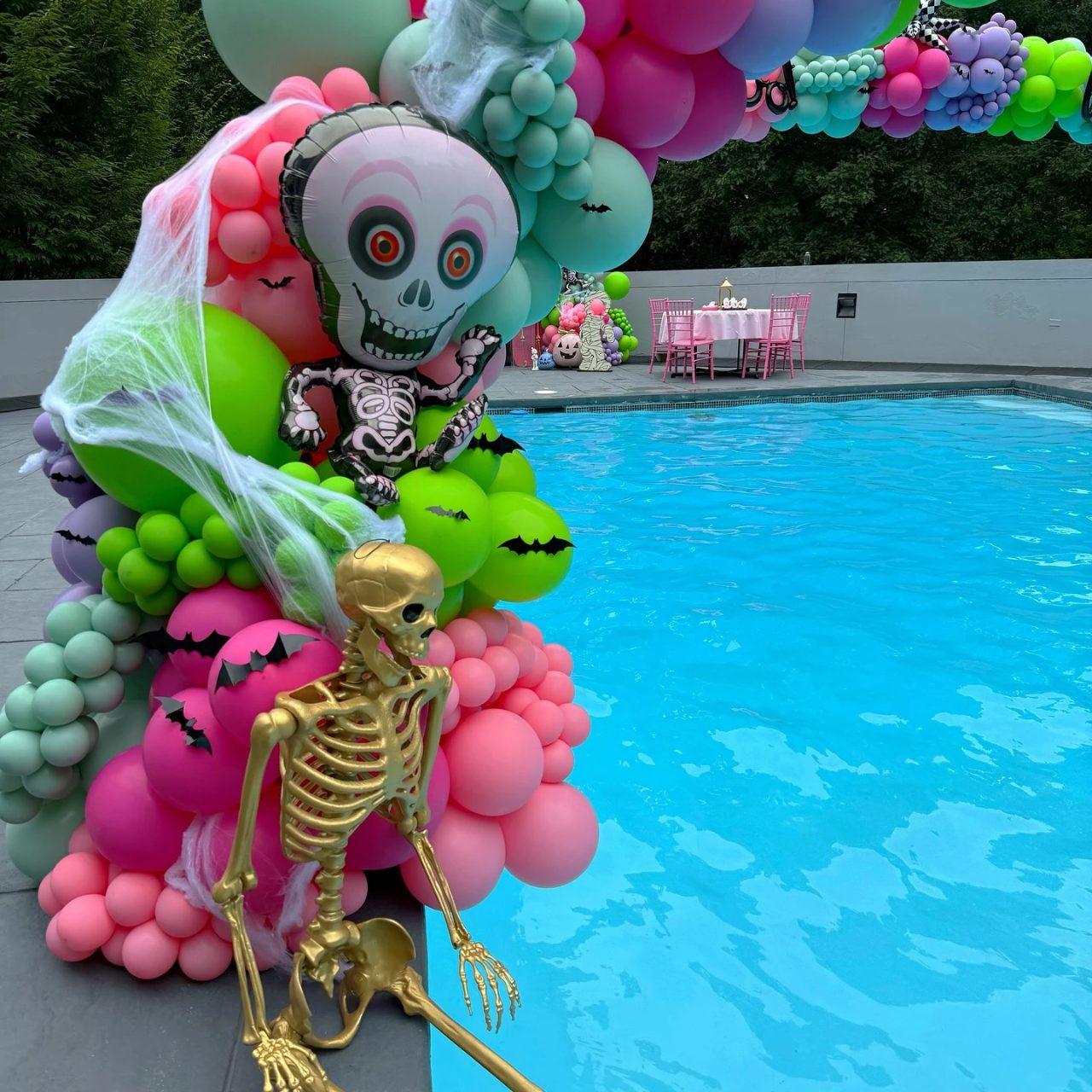Poolside Skeleton Loungers summerween party ideas