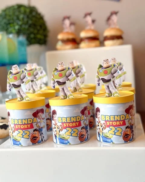 Figurine-Topped Favor Tins toy story birthday party ideas