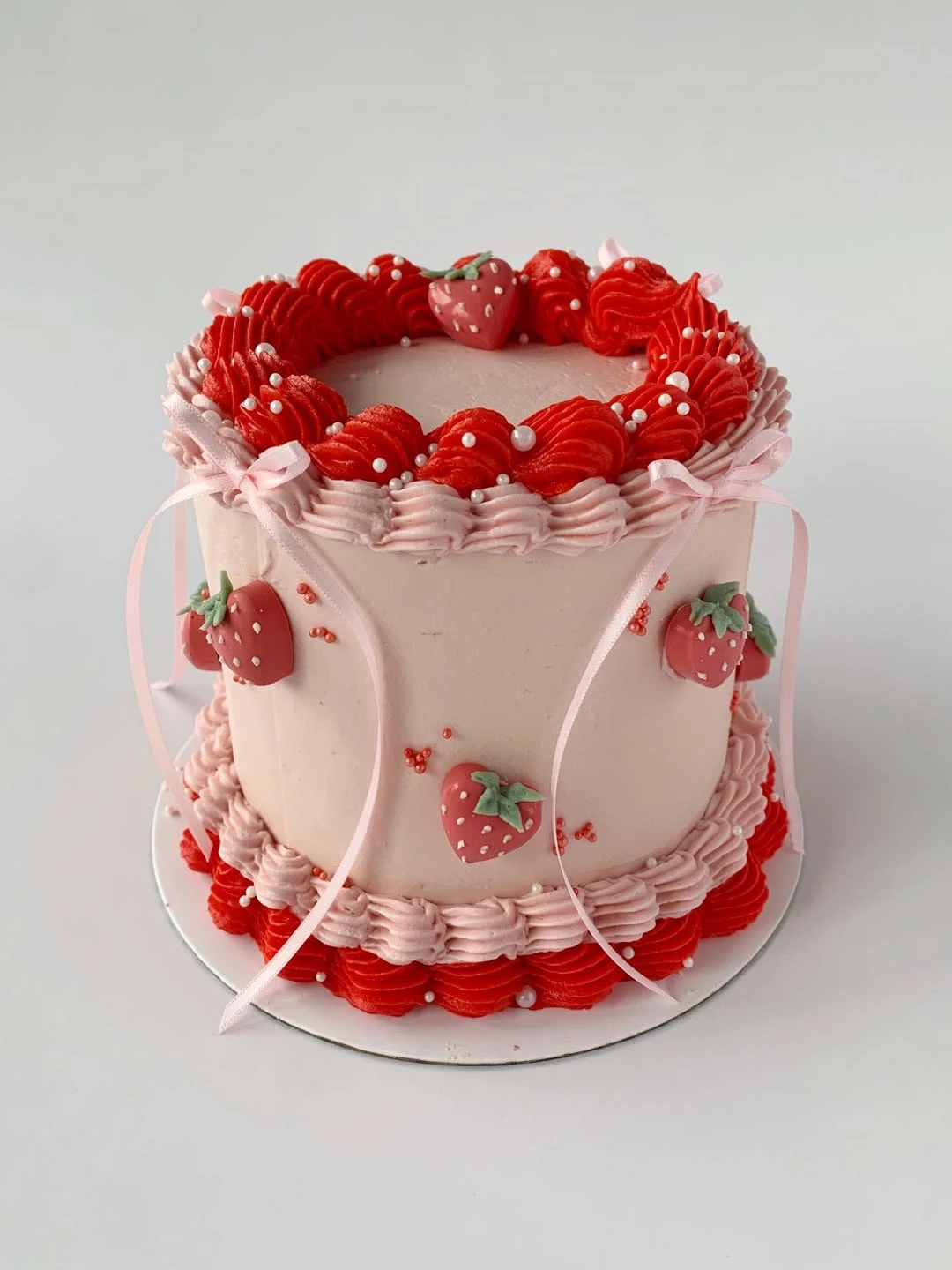 Ribbon-Accented Strawberry Smash Cake berry first birthday