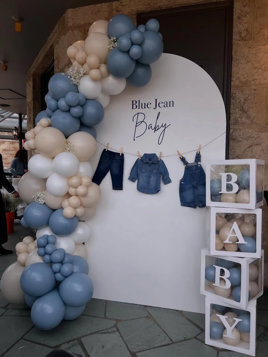 Arched Clothesline Photo Wall blue jean baby shower