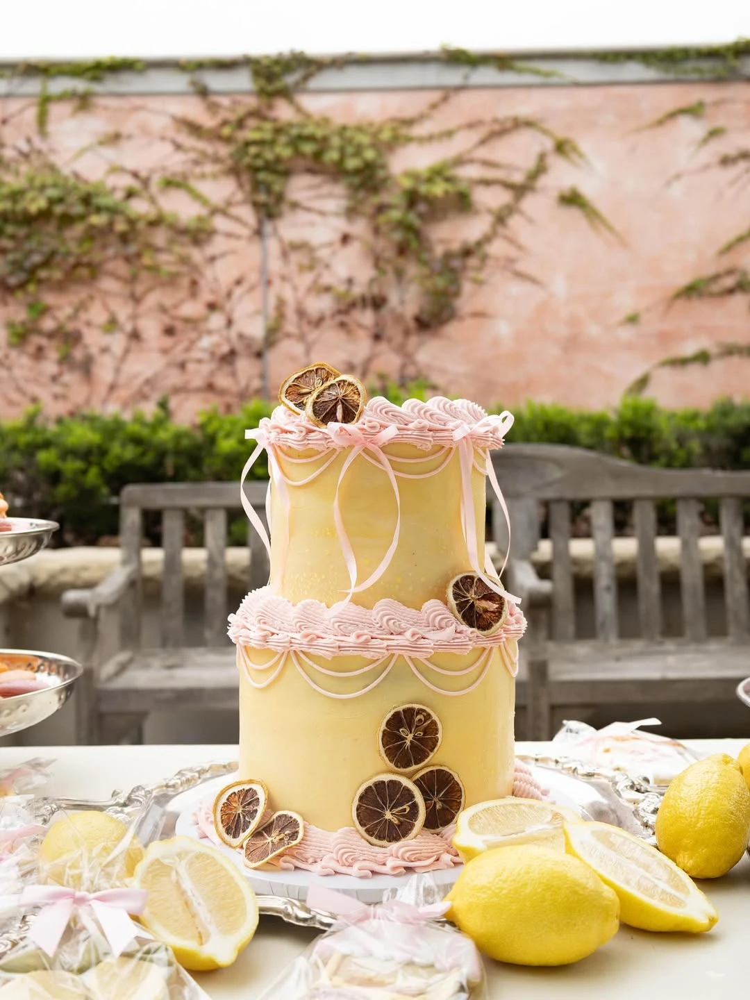 Bow-Accented Lemon Tiered Cake ciao baby shower