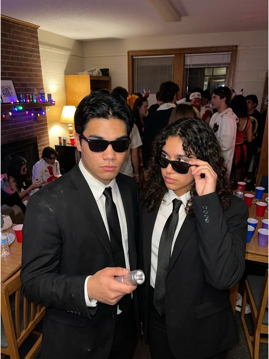 Men in Black Agents. Wear a black suit, white shirt, black tie, and dark sunglasses for a costume that takes only minutes to assemble. Carry a small silver flashlight as a harmless