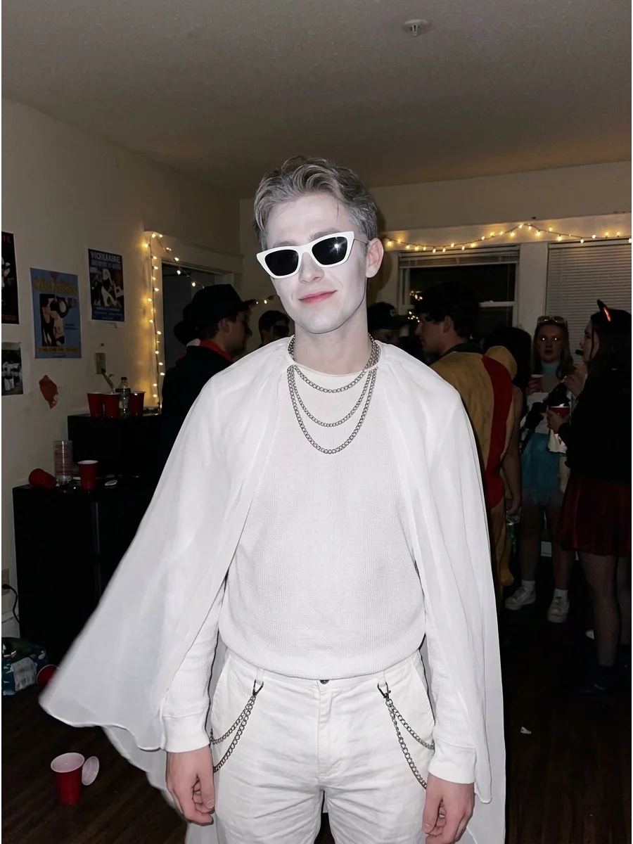 Modern Ghost. Wear a white outfit with pale makeup, white sunglasses, and silver accessories for a stylish version of a classic ghost. Add sheer fabric or a lightweight white cape