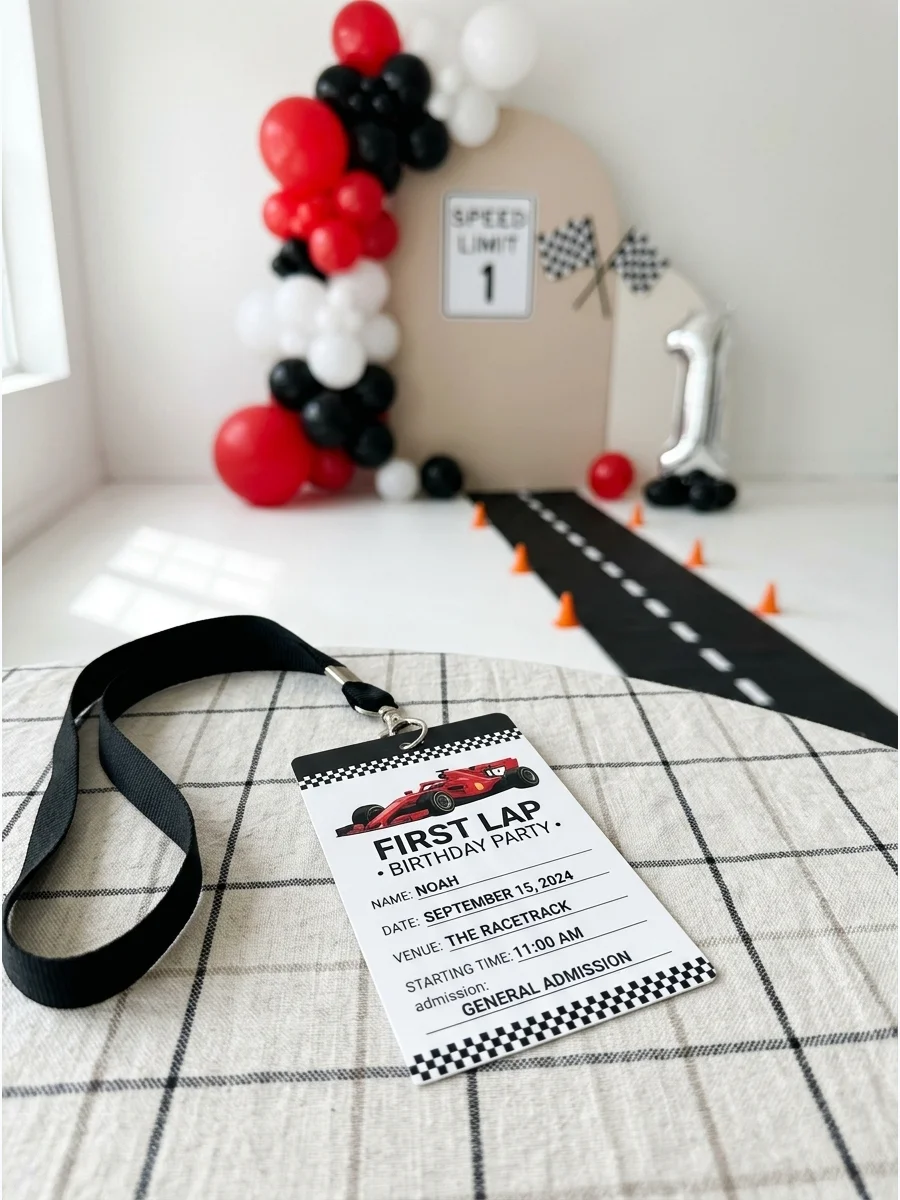 A racing-themed birthday invitation designed as a VIP pit pass with a black lanyard.