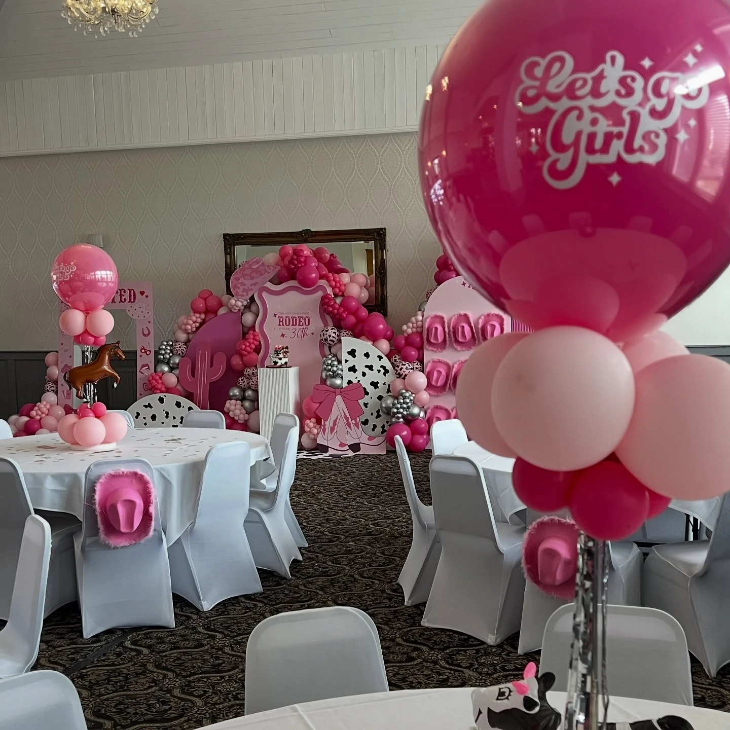 Arched Backdrop with Hat Wall first rodeo birthday party