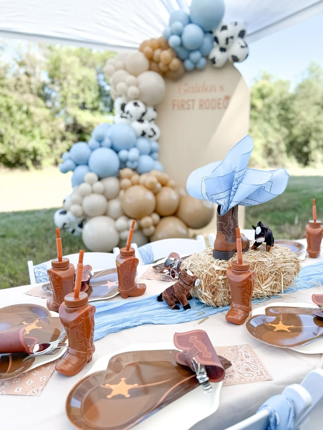 Boho-Western Table Settings first rodeo birthday party