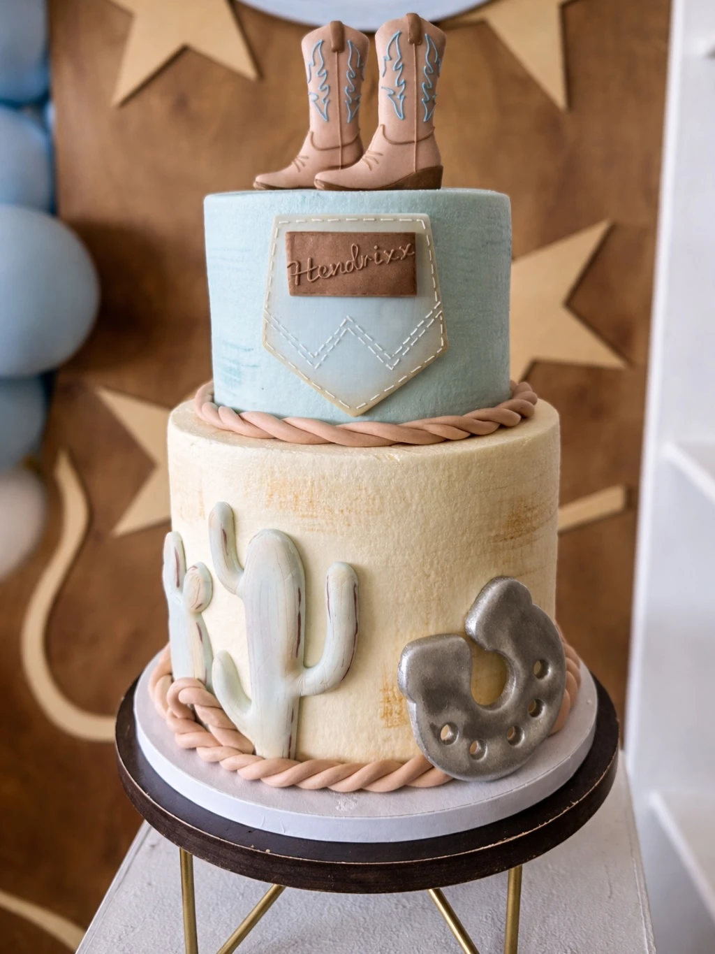 Tiered Western Motif Cake first rodeo birthday party