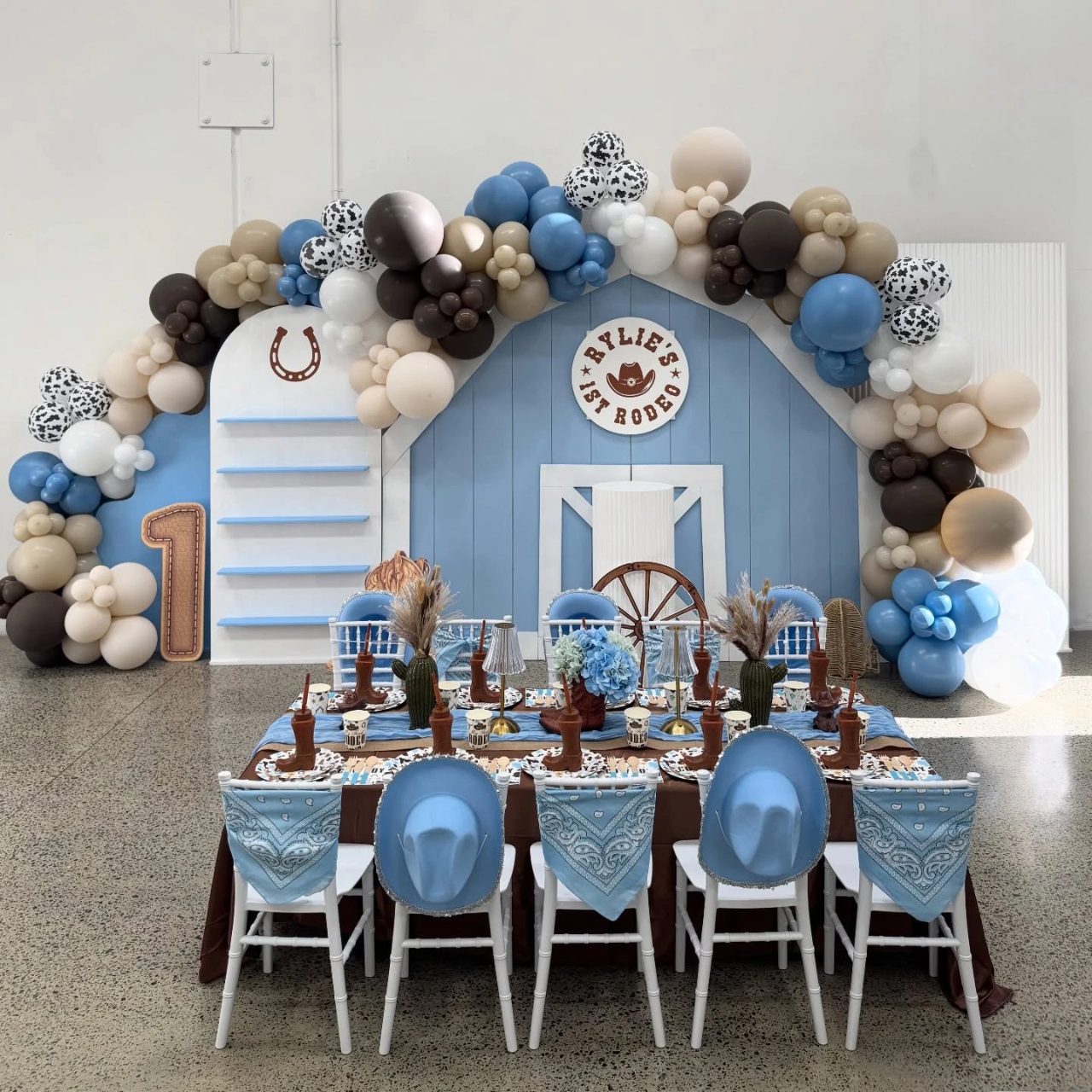 Blue Barn Backdrop Display first rodeo birthday party