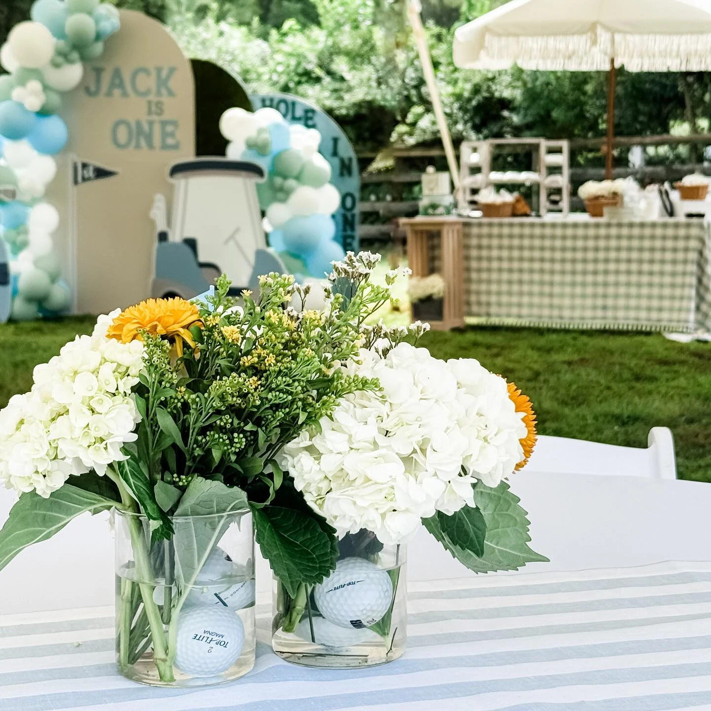 Submerged Ball Centerpieces hole in one first birthday
