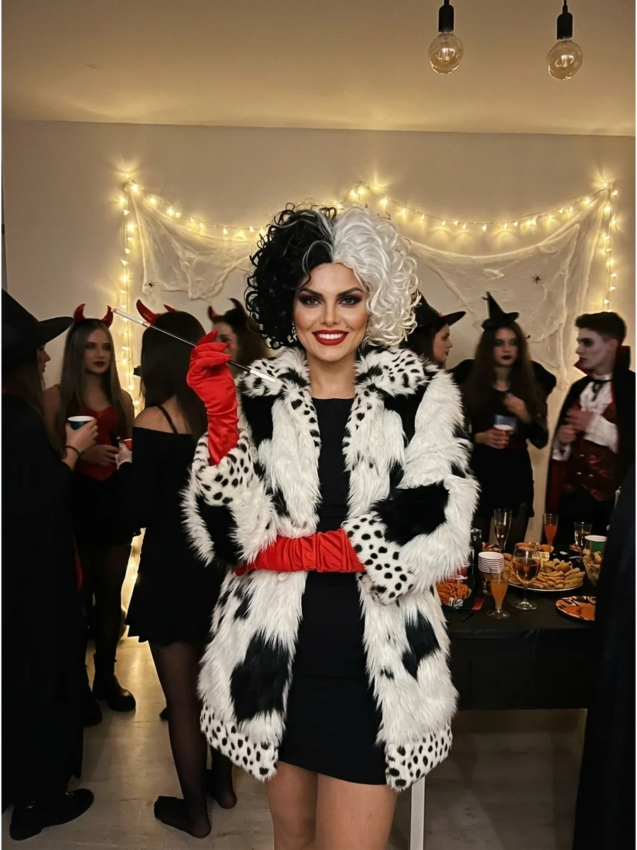 Cruella de Vil. Combine a black dress with a faux-fur coat, red gloves, dramatic makeup, and a half-black, half-white wig for a glamorous villain costume. Iconic halloween costumes