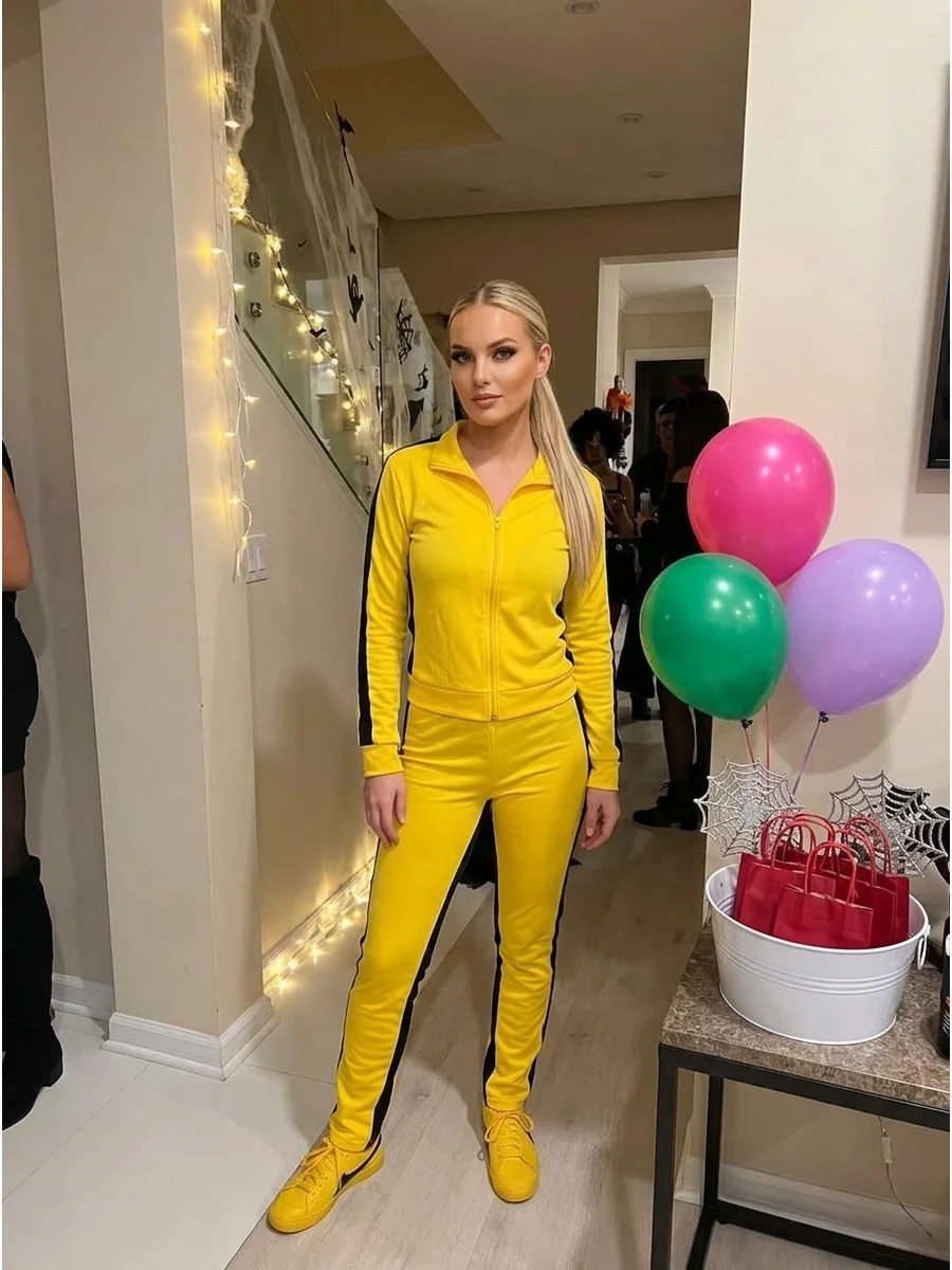 The Bride From Kill Bill. The Bride’s bright yellow tracksuit with black stripes is instantly recognizable when paired with yellow sneakers and a sleek blonde ponytail. Iconic hall