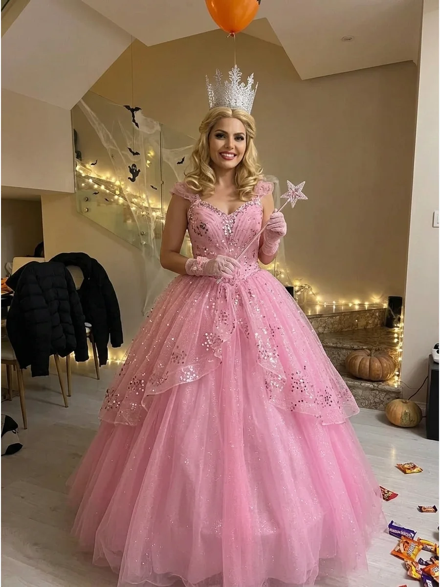 Glinda From Wicked. Wear a sparkling pink ball gown, silver crown, delicate gloves, and a star-tipped wand to transform into the glamorous and cheerful Glinda. Iconic halloween cos