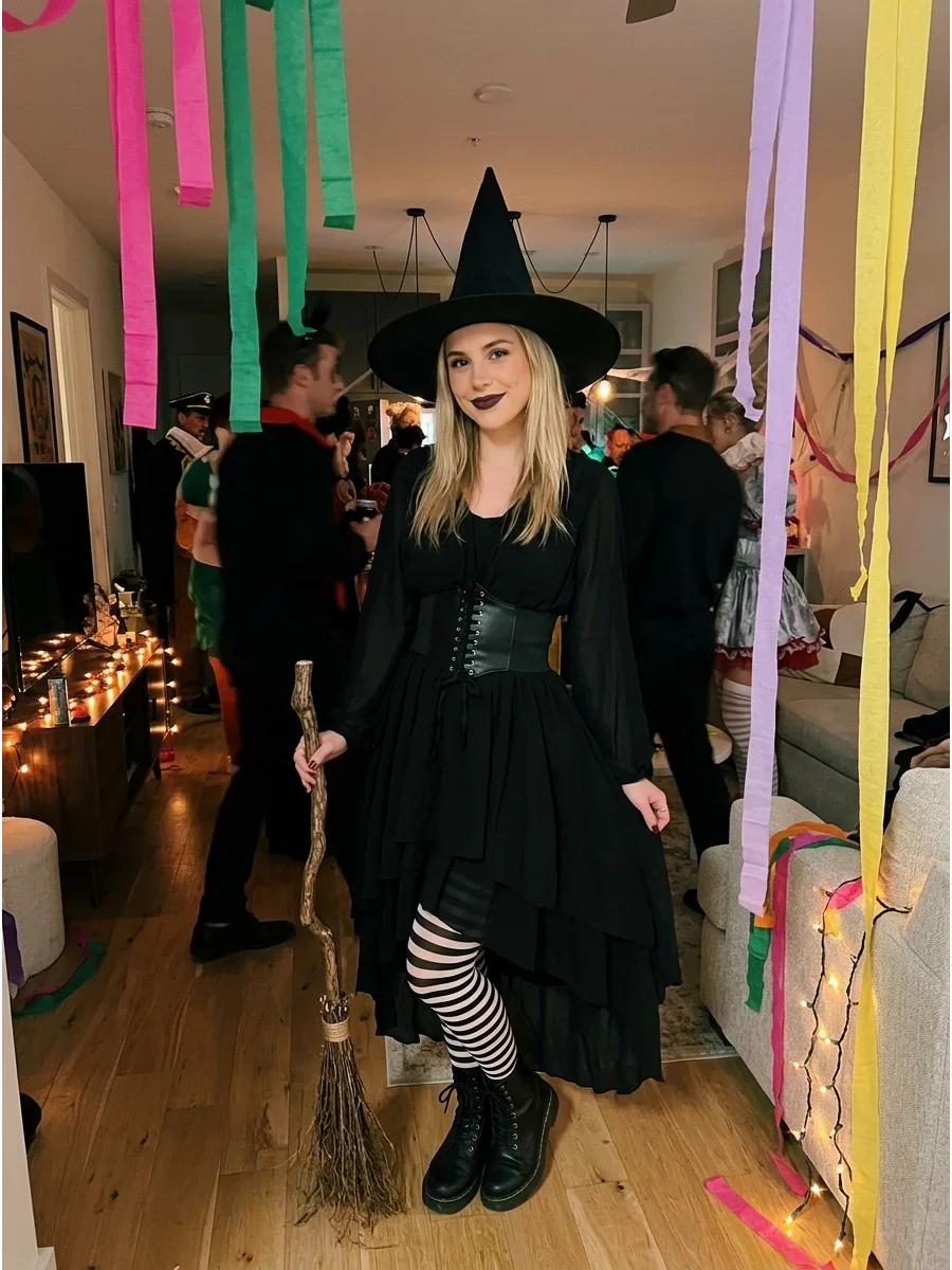 Classic Black Witch. A flowing black dress, pointed hat, lace-up boots, striped tights, and dark lipstick create a timeless witch costume that can be glamorous or spooky. Iconic ha