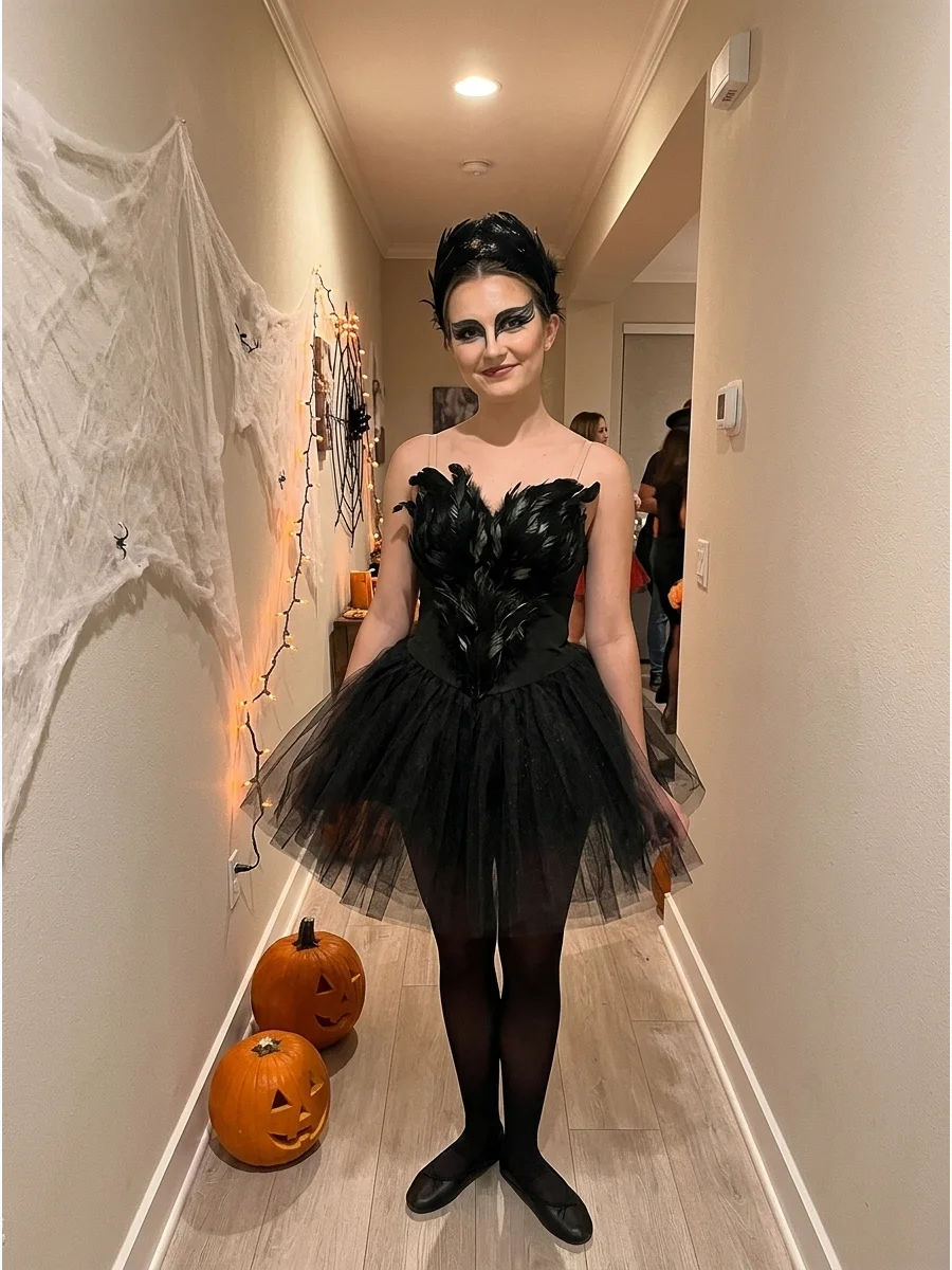 Black Swan. Wear a black ballet-inspired dress with a feathered headpiece, black tights, ballet flats, and dramatic winged eye makeup. Iconic halloween costumes women