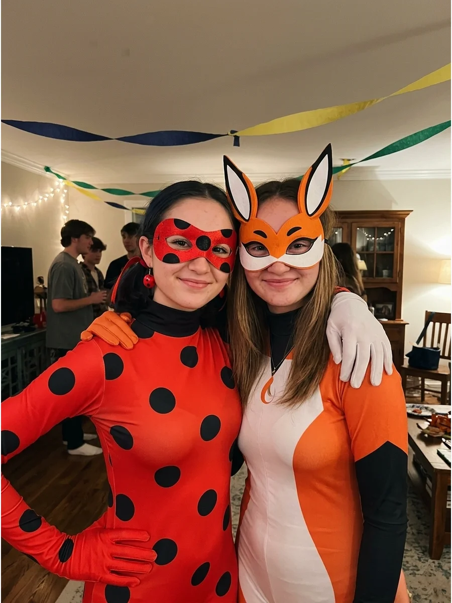 Ladybug and Rena Rouge. Pair Ladybug’s red-and-black spotted costume with Rena Rouge’s orange fox-inspired outfit. Matching masks, gloves, and coordinated poses will help connect t